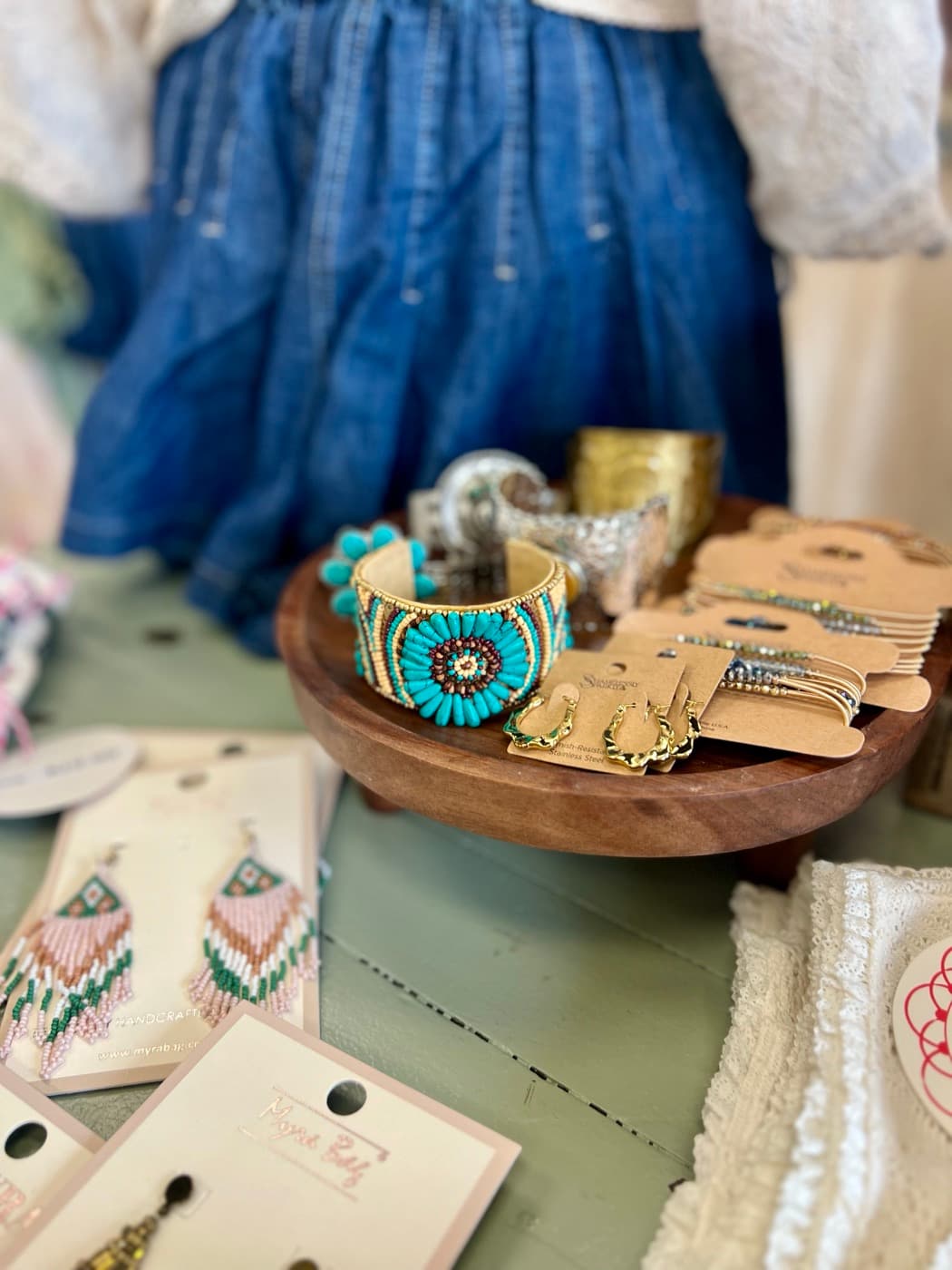 Handmade jewelry on a display tray